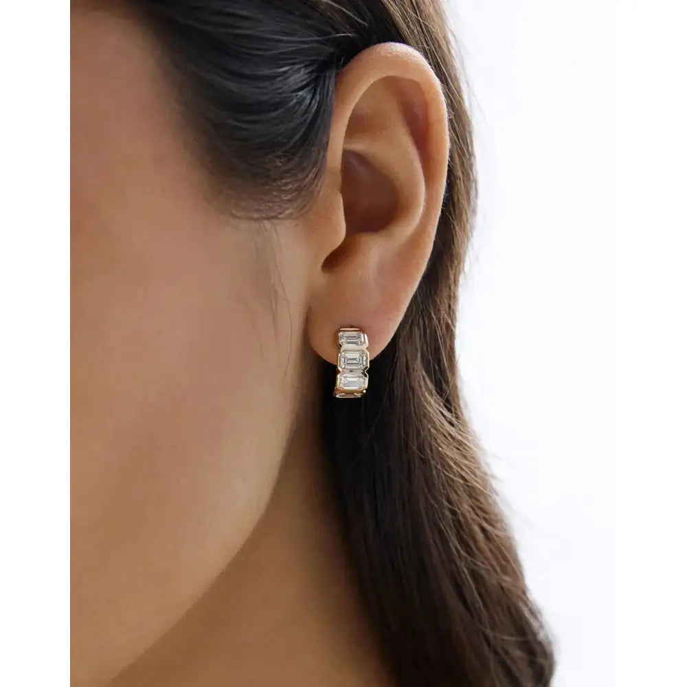 Stunning Bezel-Set Emerald Lab Diamond Huggie Earrings.
