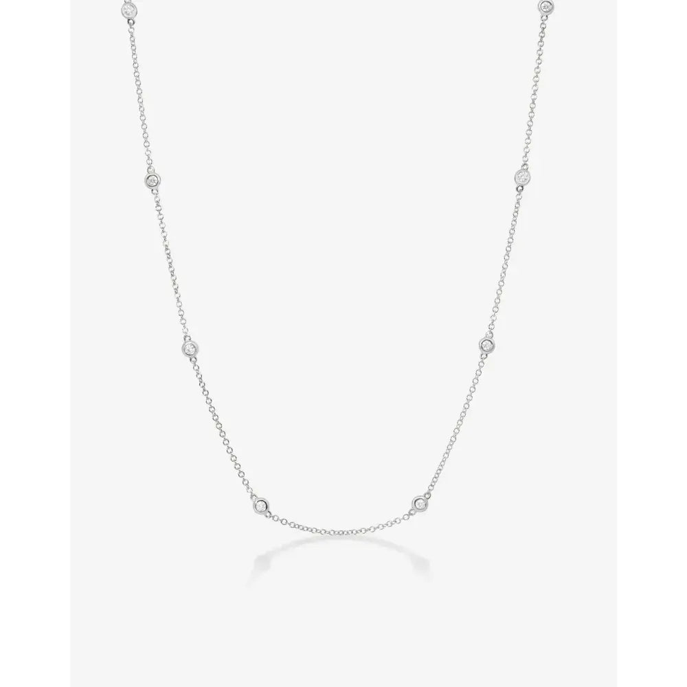 Stunning Diamond Bezel Station Necklace for Timeless Elegance.