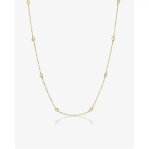 Stunning Diamond Bezel Station Necklace for Timeless Elegance.