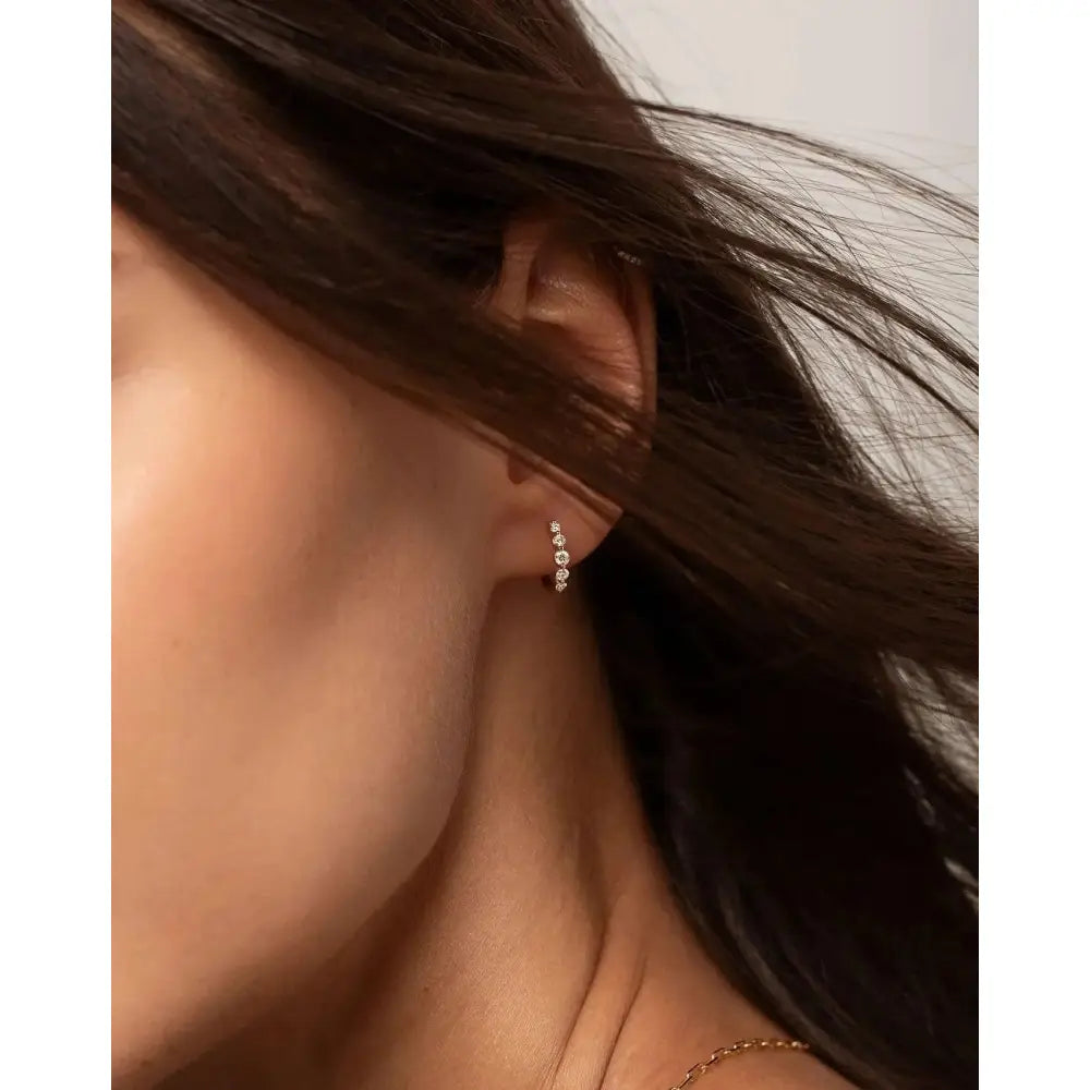Stunning Graduated Diamond Huggie Earrings for Effortless Elegance.