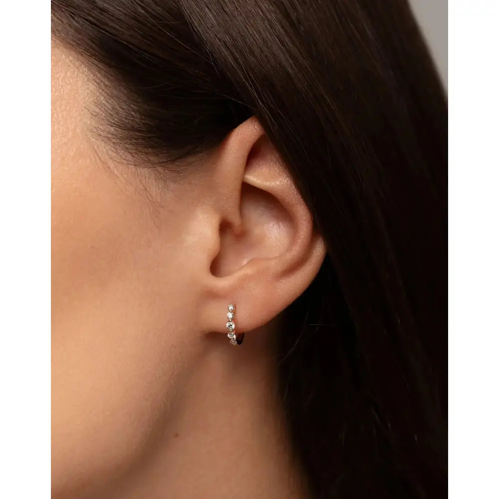 Stunning Graduated Diamond Huggie Earrings for Effortless Elegance.