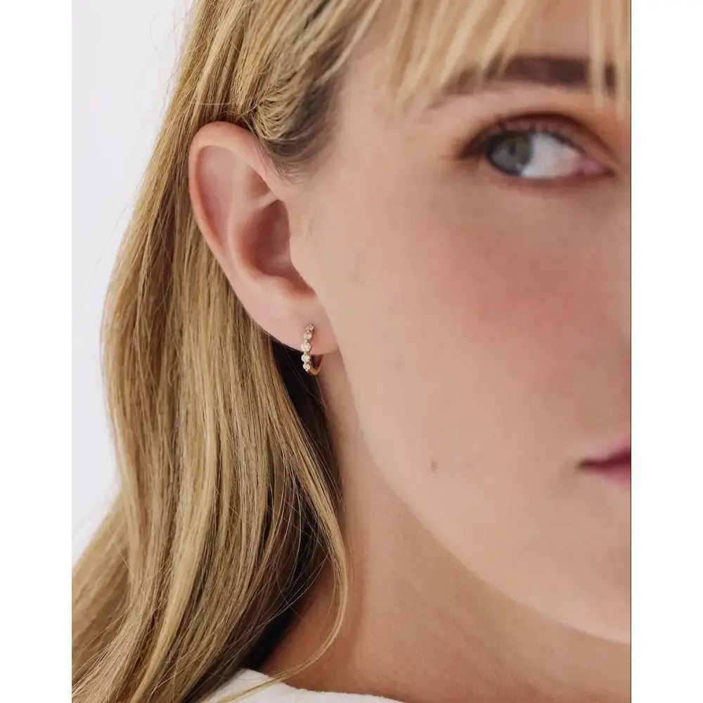 Stunning Graduated Diamond Huggie Earrings for Effortless Elegance.