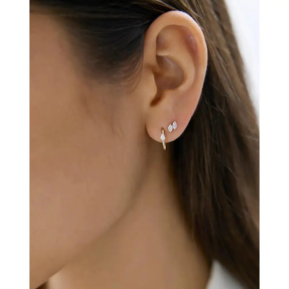 Stunning Mini Pear Diamond Huggies for Effortless Elegance.