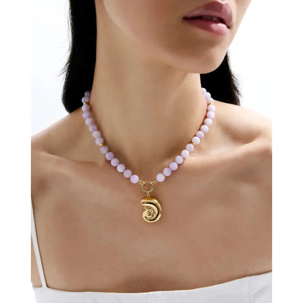 Stunning Nautilus Shell Pendant - Embrace Ocean Elegance.