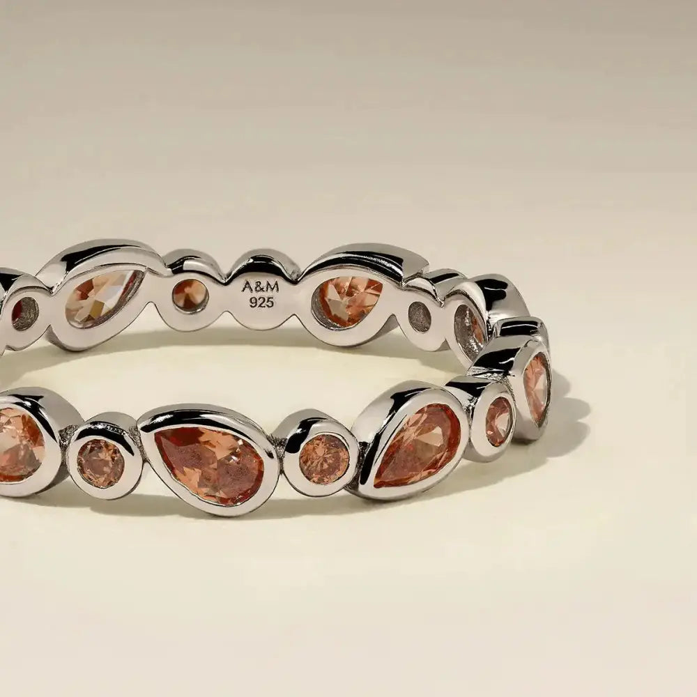 Stunning Silver Sunset Pear Band Ring - Elevate Your Style!.