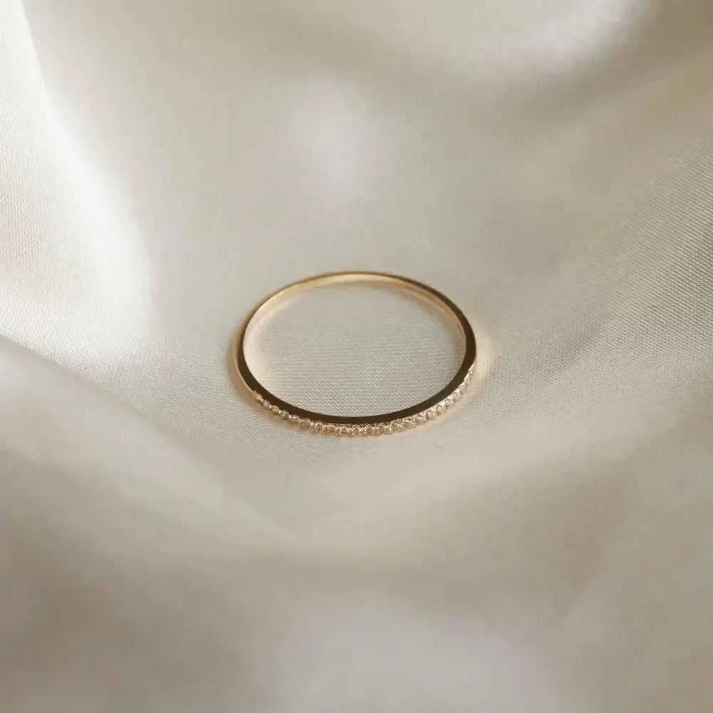 Stunning Solid Gold Topaz Eternity Ring - A Timeless Treasure.