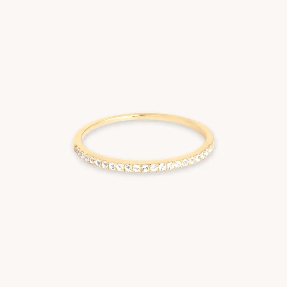 Stunning Solid Gold Topaz Eternity Ring - A Timeless Treasure.